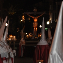 La Confraria amb el Pas del Sant Crist al fons. Processó Setmana Santa de Felanitx de 2009